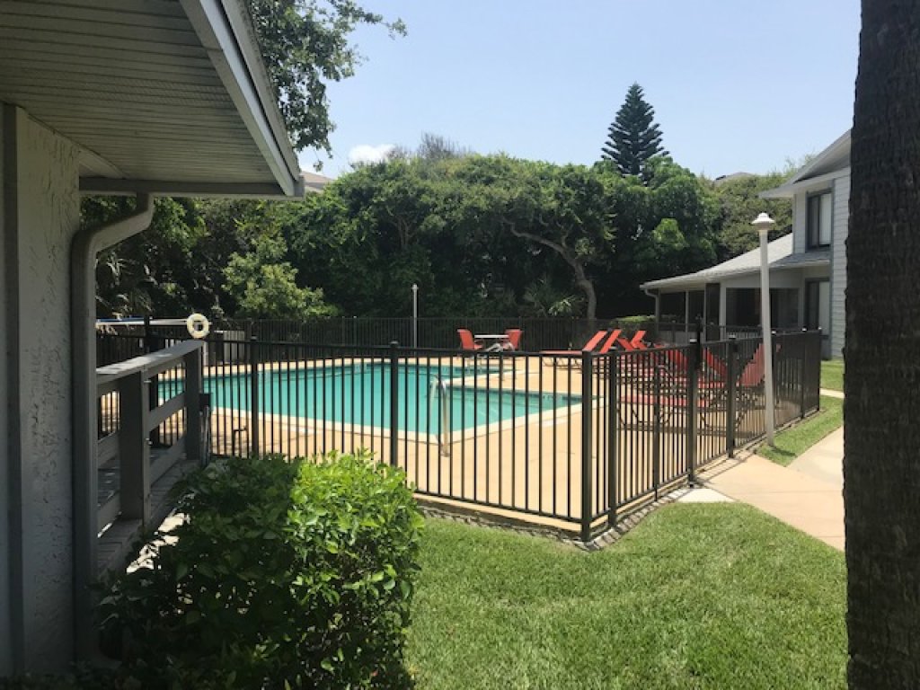 Quaint condo with pool and across the street from Beach Vacation Rental in New Smyrna Beach - RedAwning