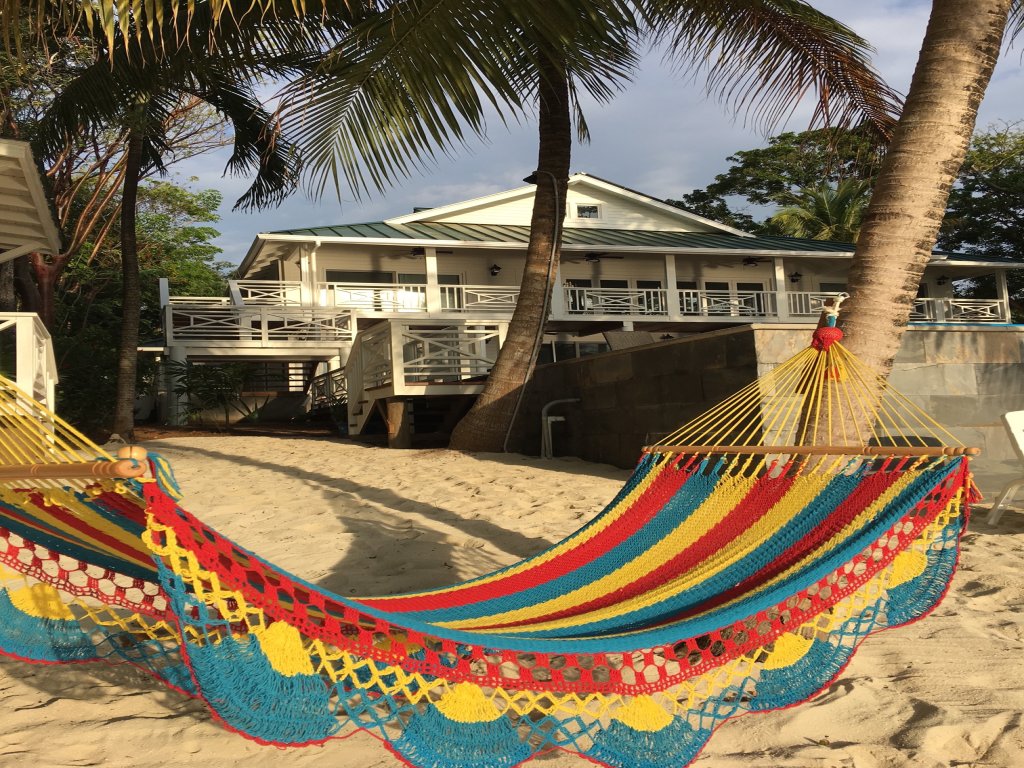 Serenity Beach House Vacation Rental in West End - RedAwning