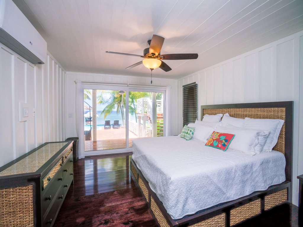 Serenity Beach House Vacation Rental in West End - RedAwning
