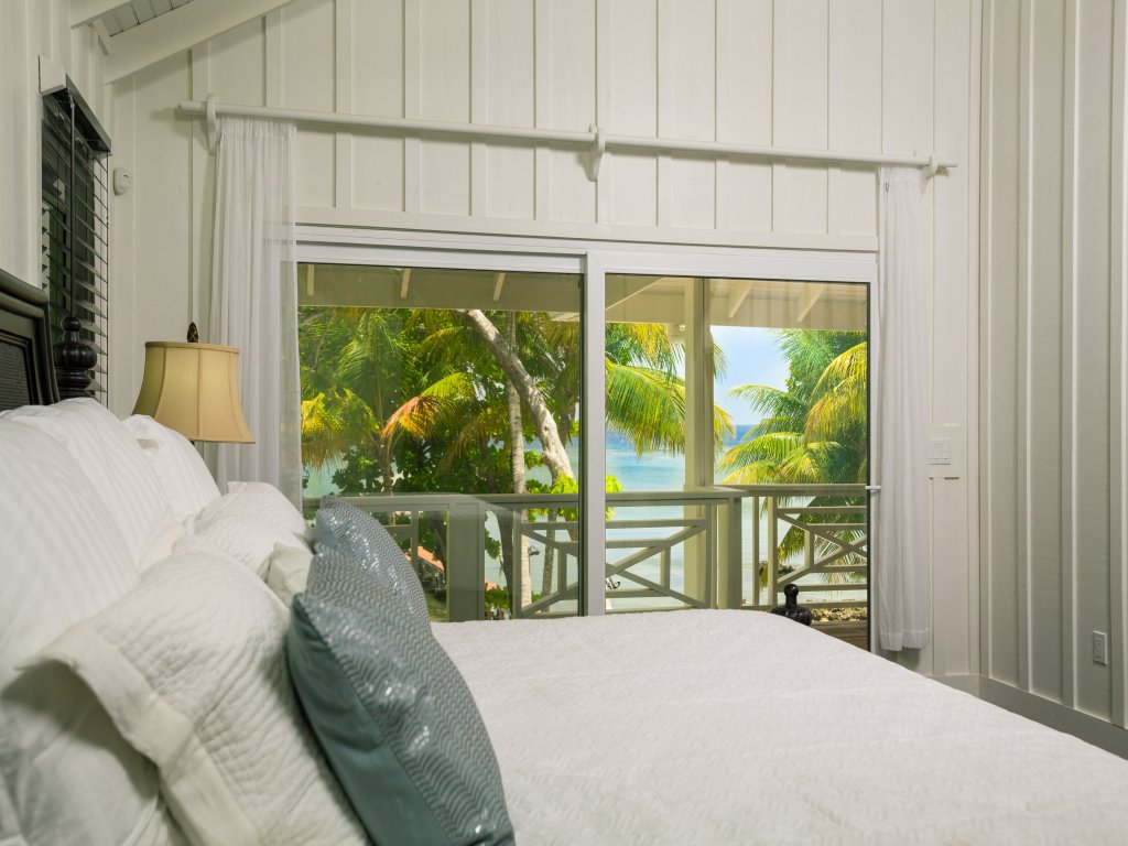 Serenity Beach House Vacation Rental in West End - RedAwning