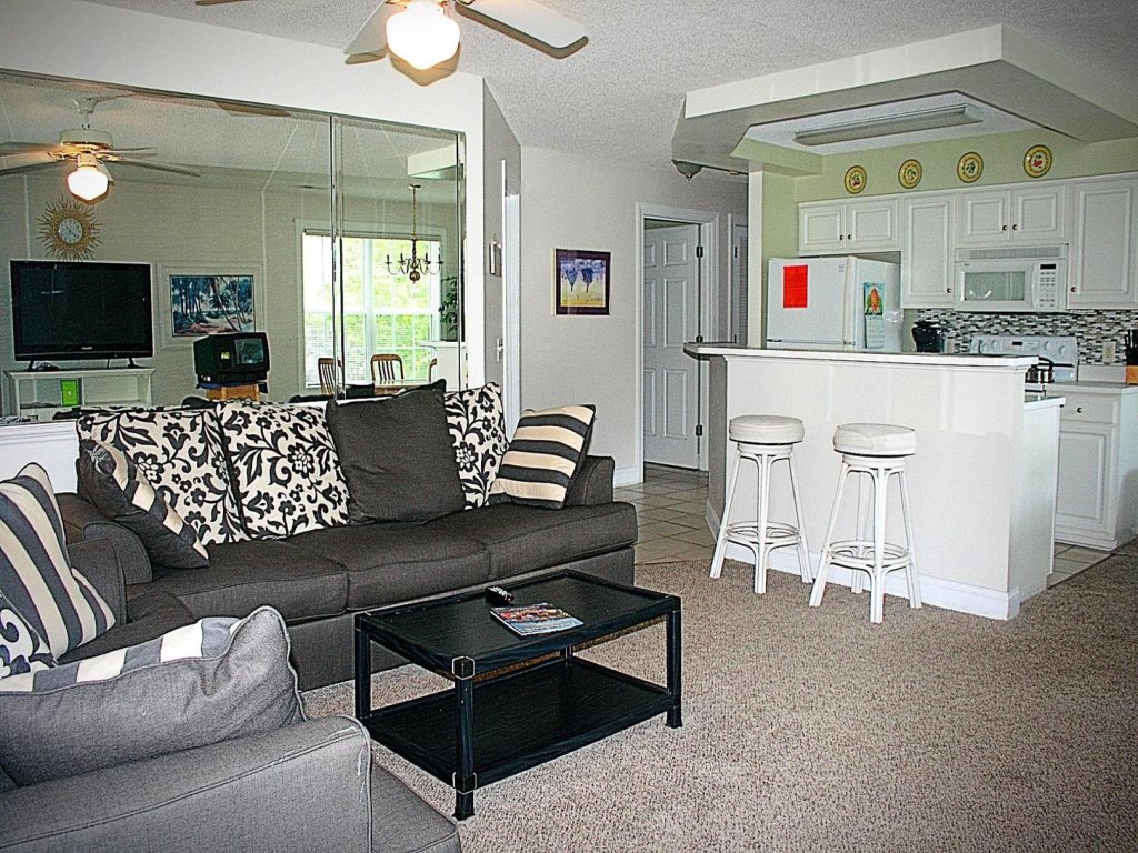 Brunswick Plantation Condo 1404M with Full Kitchen and 27 hole Golf Course Onsite Vacation Rental in Calabash - RedAwning