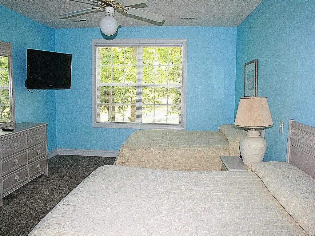 Brunswick Plantation Condo 1404M with Full Kitchen and 27 hole Golf Course Onsite Vacation Rental in Calabash - RedAwning