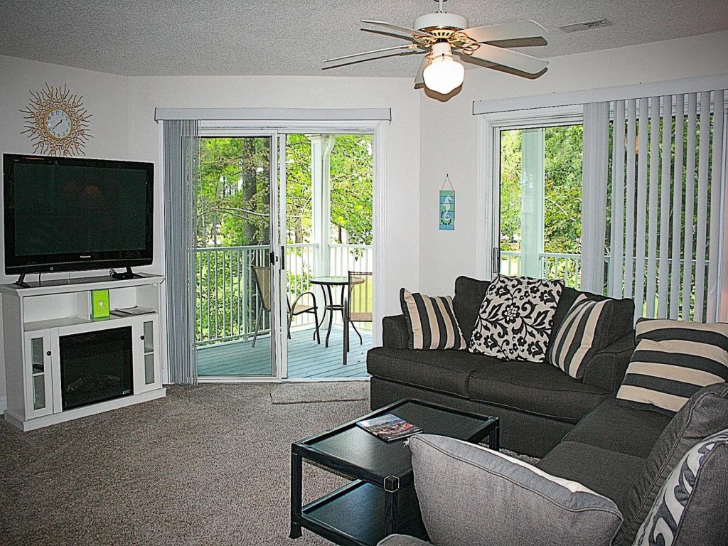 Brunswick Plantation Condo 1404M with Full Kitchen and 27 hole Golf Course Onsite Vacation Rental in Calabash - RedAwning