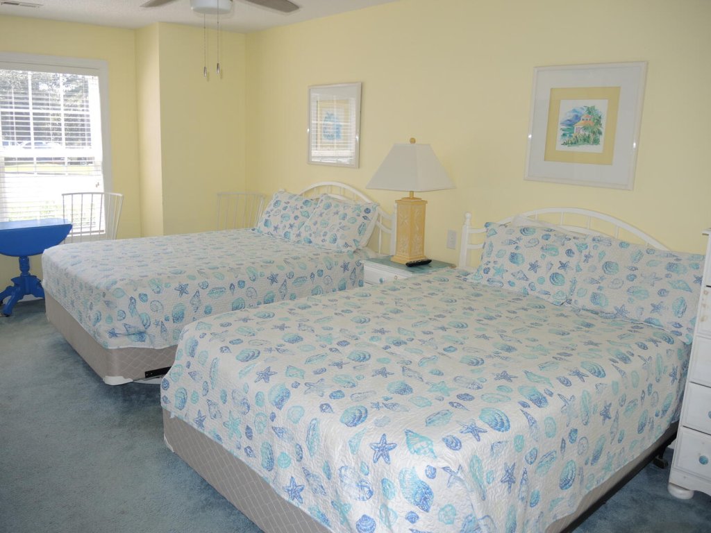 Beautiful Ground Floor Golf Resort Villa 1503 Steps from the Pool Vacation Rental in Calabash - RedAwning