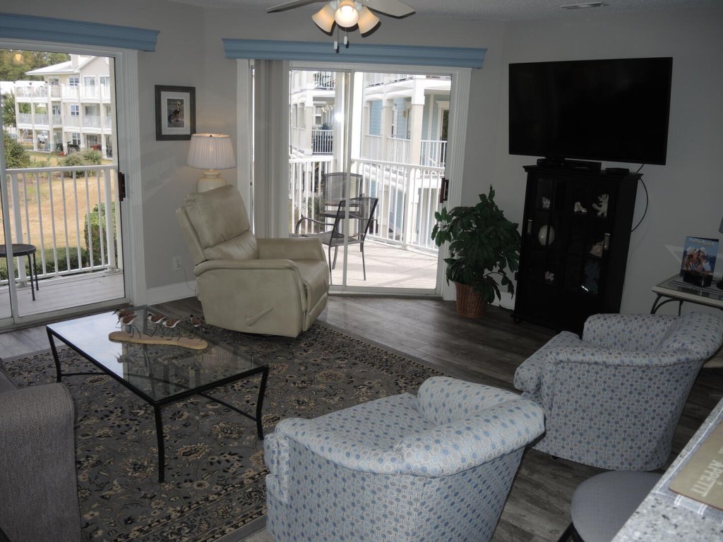 Brunswick Plantation Resort Villa 308 with Sleek Interior and Golf Course Onsite Vacation Rental in Calabash - RedAwning
