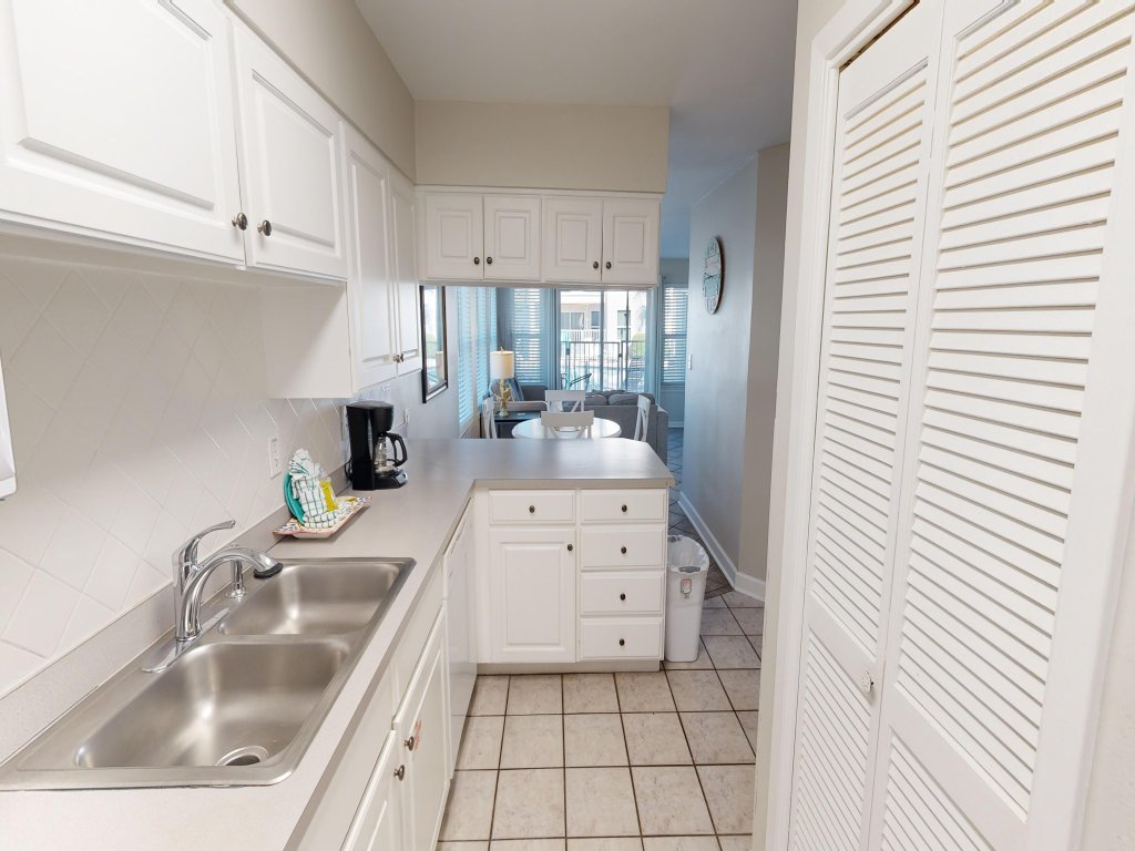 Poolside Villas 101 is a ground floor 2 BR with easy access to pool and jetties Vacation Rental in Destin - RedAwning