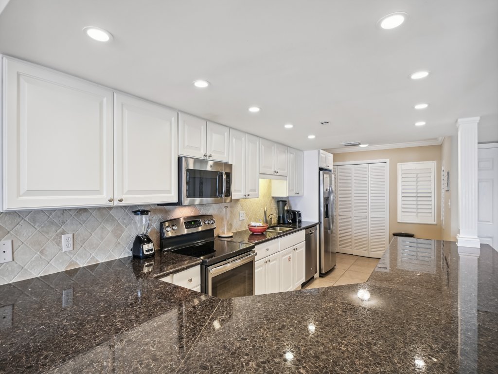 IR 102 is a large 2 BR on the Gulf with free beach set up for 2 (seasonal) Vacation Rental in Destin - RedAwning