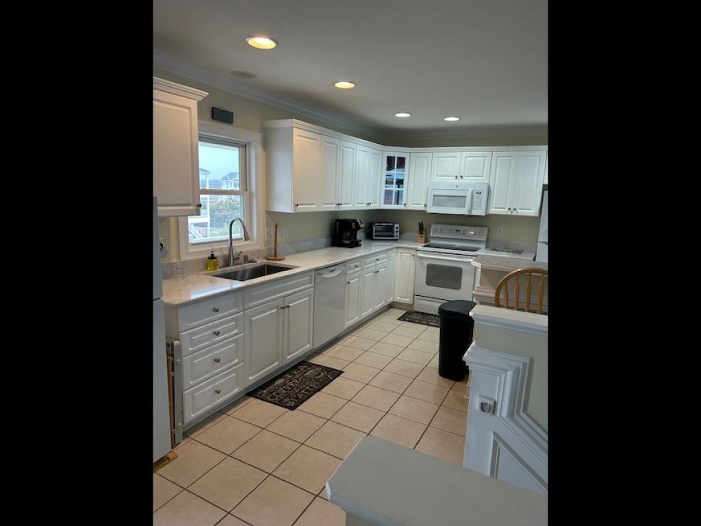 Salt, Sand and Sudds / 1043 Coquina Cove Drive Vacation Rental in Holden Beach - RedAwning
