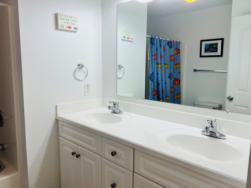 Salt, Sand and Sudds / 1043 Coquina Cove Drive Vacation Rental in Holden Beach - RedAwning