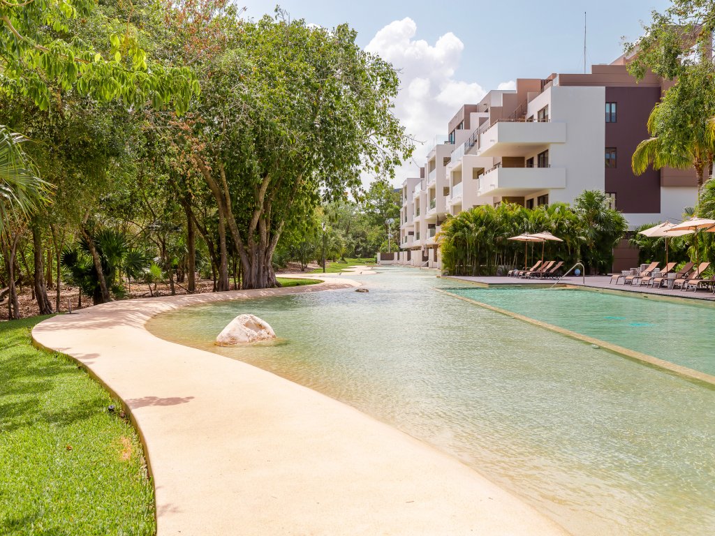 Condo Maxim E 305 Lorena Ochoa Golf Residences inside Corasol  Vacation Rental - RedAwning