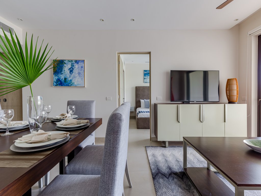 Condo Maxim E 305 Lorena Ochoa Golf Residences inside Corasol  Vacation Rental - RedAwning