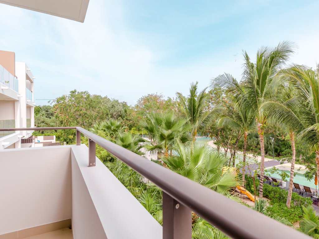 Condo Jade E304 Lorena Ochoa Golf Residences  Vacation Rental - RedAwning