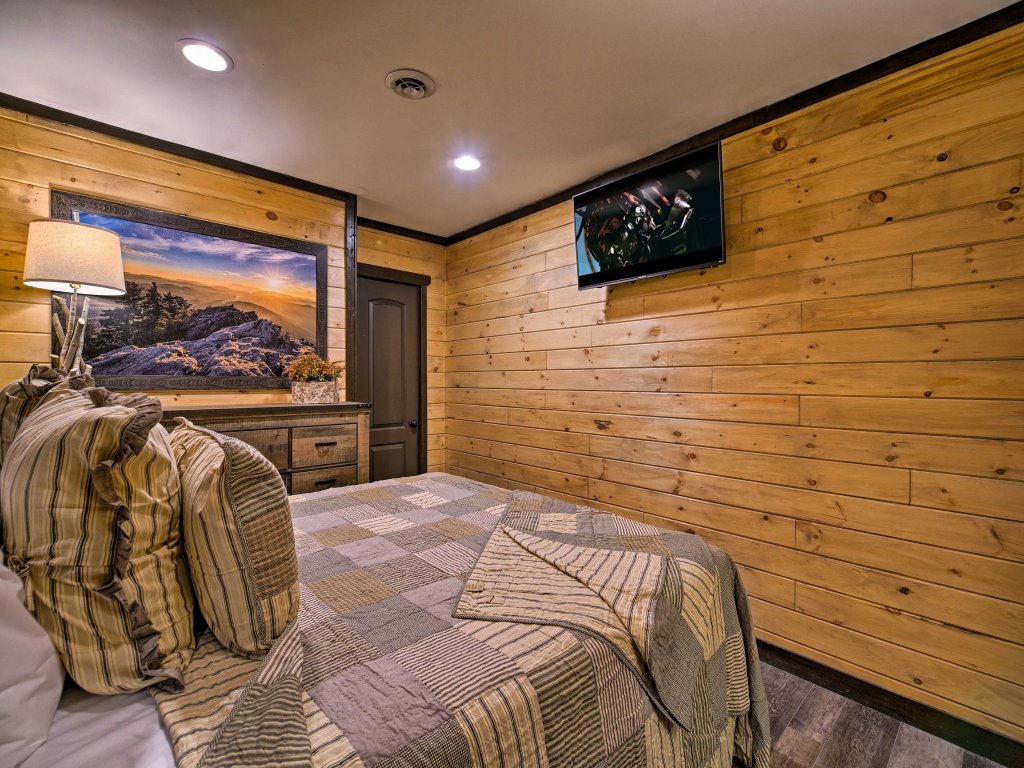 Rebel Retreat Cabin with Stadium Seating Home Theater Vacation Rental in Sevierville - RedAwning