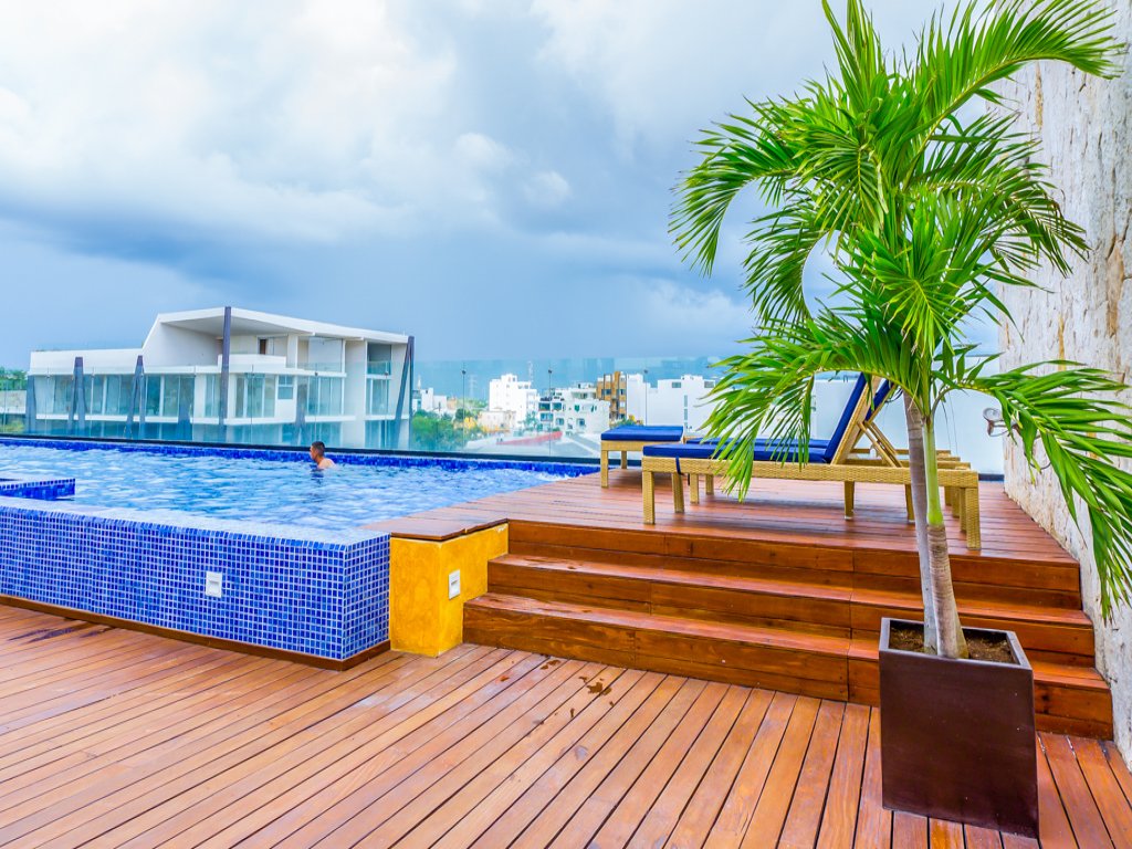 Lunada 314 Modern Playa del Carmen Condo with Tropical Garden View Vacation Rental - RedAwning