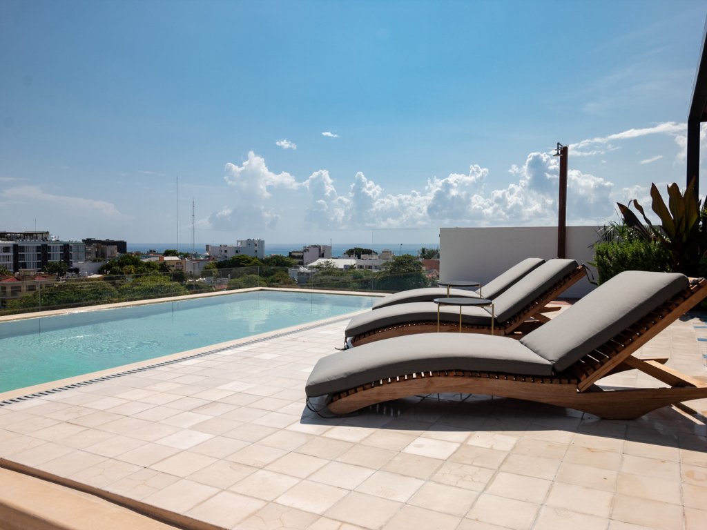 Riva 202 Playa del Carmen Condo Minutes from the Beach and 5th Avenue Vacation Rental - RedAwning