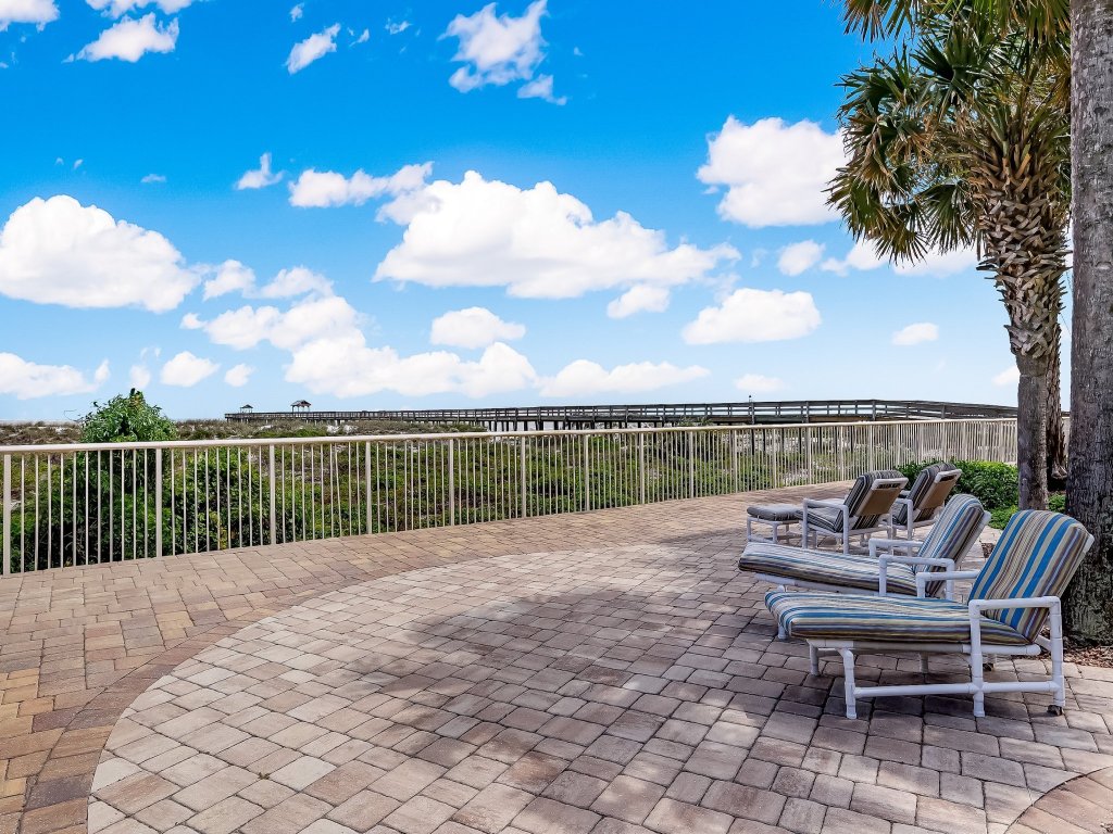 Upper unit Overlooking the Beautiful Outdoor Space and Pier Vacation Rental in Fernandina Beach - RedAwning