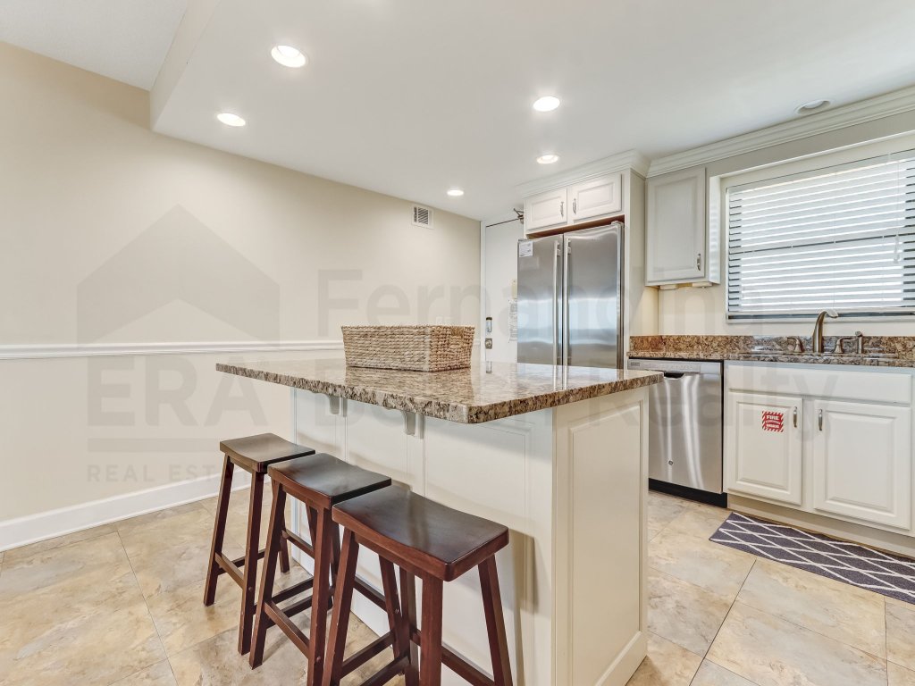 Upper unit Overlooking the Beautiful Outdoor Space and Pier Vacation Rental in Fernandina Beach - RedAwning