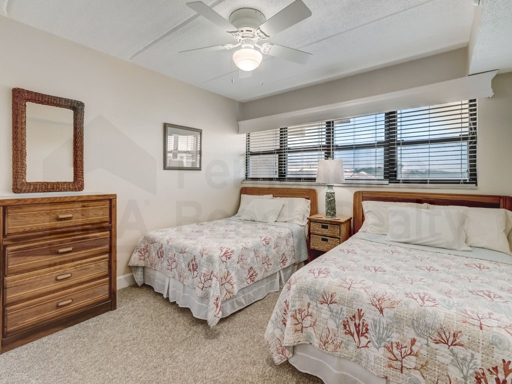 Upper unit Overlooking the Beautiful Outdoor Space and Pier Vacation Rental in Fernandina Beach - RedAwning