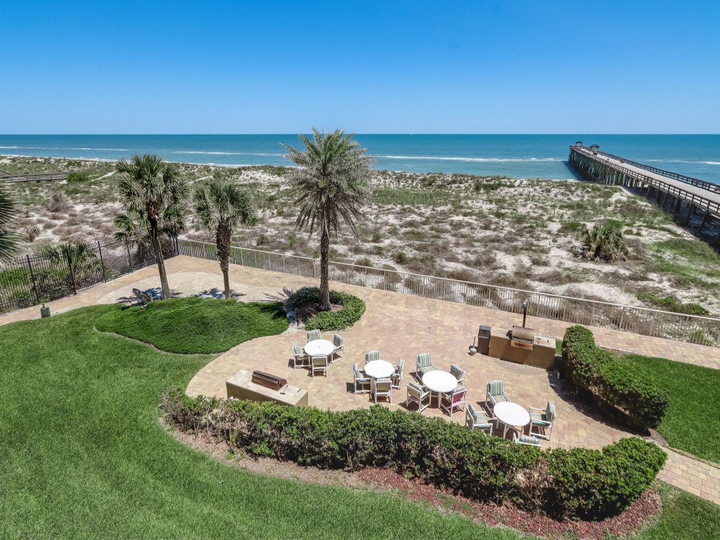 Upper unit Overlooking the Beautiful Outdoor Space and Pier Vacation Rental in Fernandina Beach - RedAwning