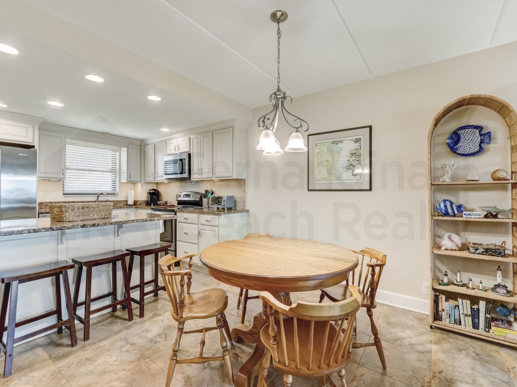 Upper unit Overlooking the Beautiful Outdoor Space and Pier Vacation Rental in Fernandina Beach - RedAwning