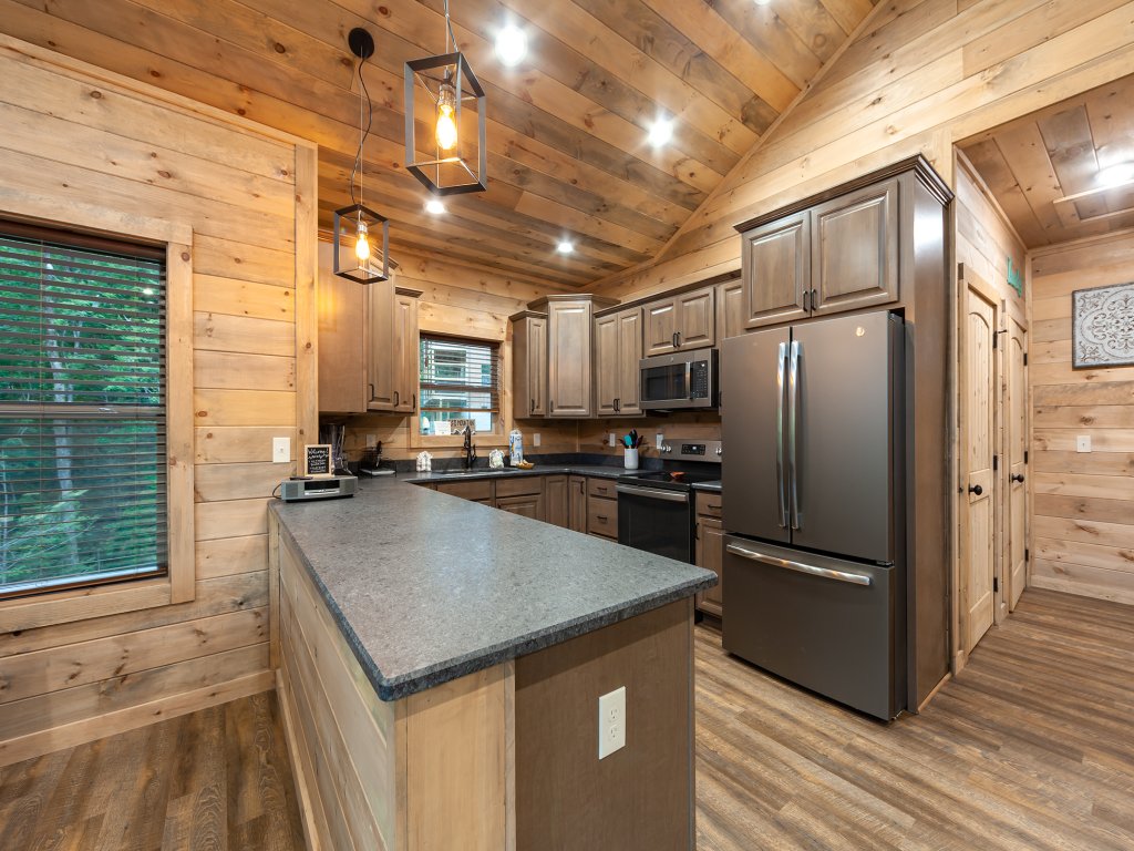 Brand New Freedom Cabin with Large Deck Vacation Rental in Sevierville - RedAwning