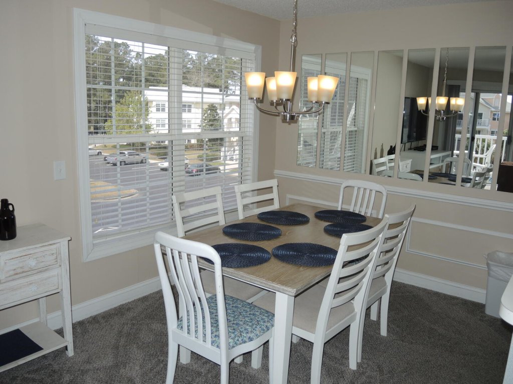 Pool View Unit 1509 at Brunswick Plantation feature 27 hole Golf Course Onsite Vacation Rental in Calabash - RedAwning