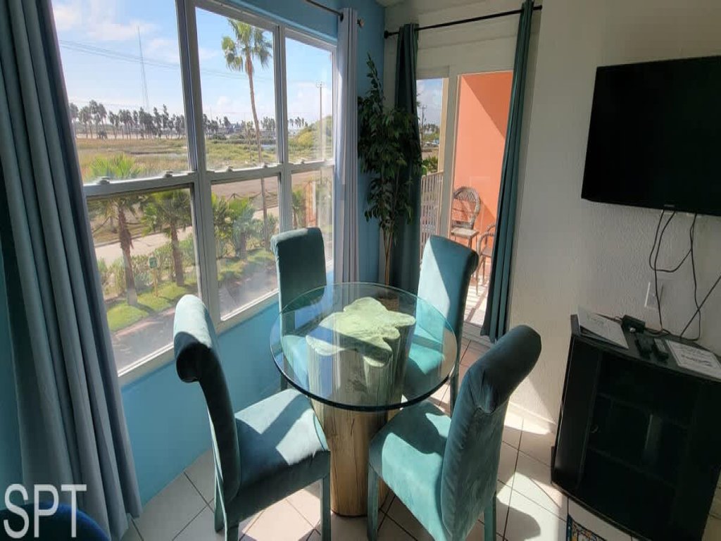 2BR · Private Beach Access · Pool & Heated Hot Tub Vacation Rental in South Padre Island - RedAwning