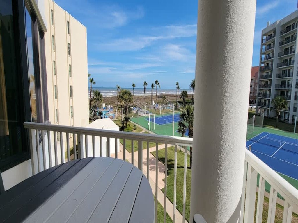 * Heated Pool * Sleeps Many Beachfront Resort Vacation Rental in South Padre Island - RedAwning