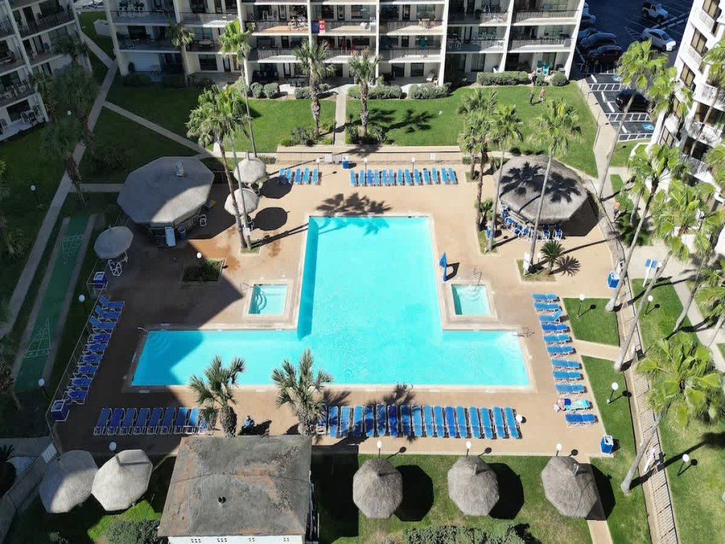 * Heated Pool * Sleeps Many Beachfront Resort Vacation Rental in South Padre Island - RedAwning
