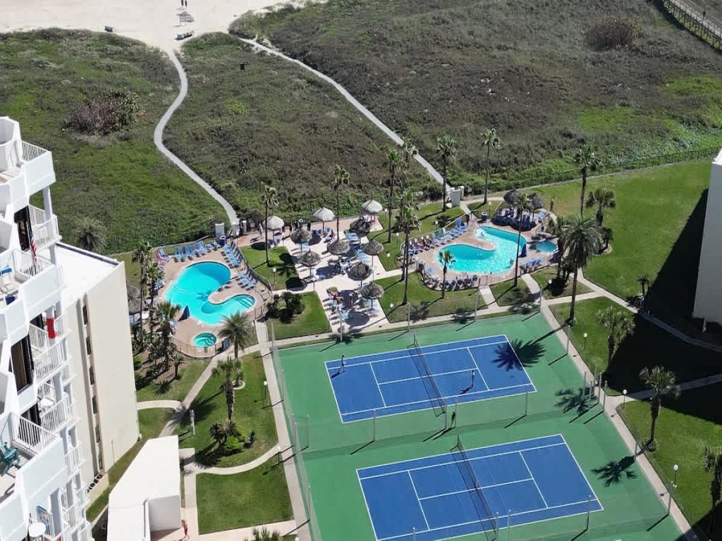 * Heated Pool * Sleeps Many Beachfront Resort Vacation Rental in South Padre Island - RedAwning