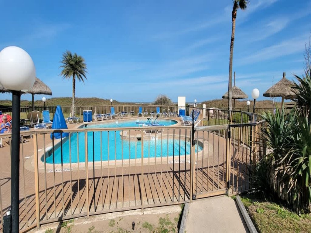* Heated Pool * Sleeps Many Beachfront Resort Vacation Rental in South Padre Island - RedAwning