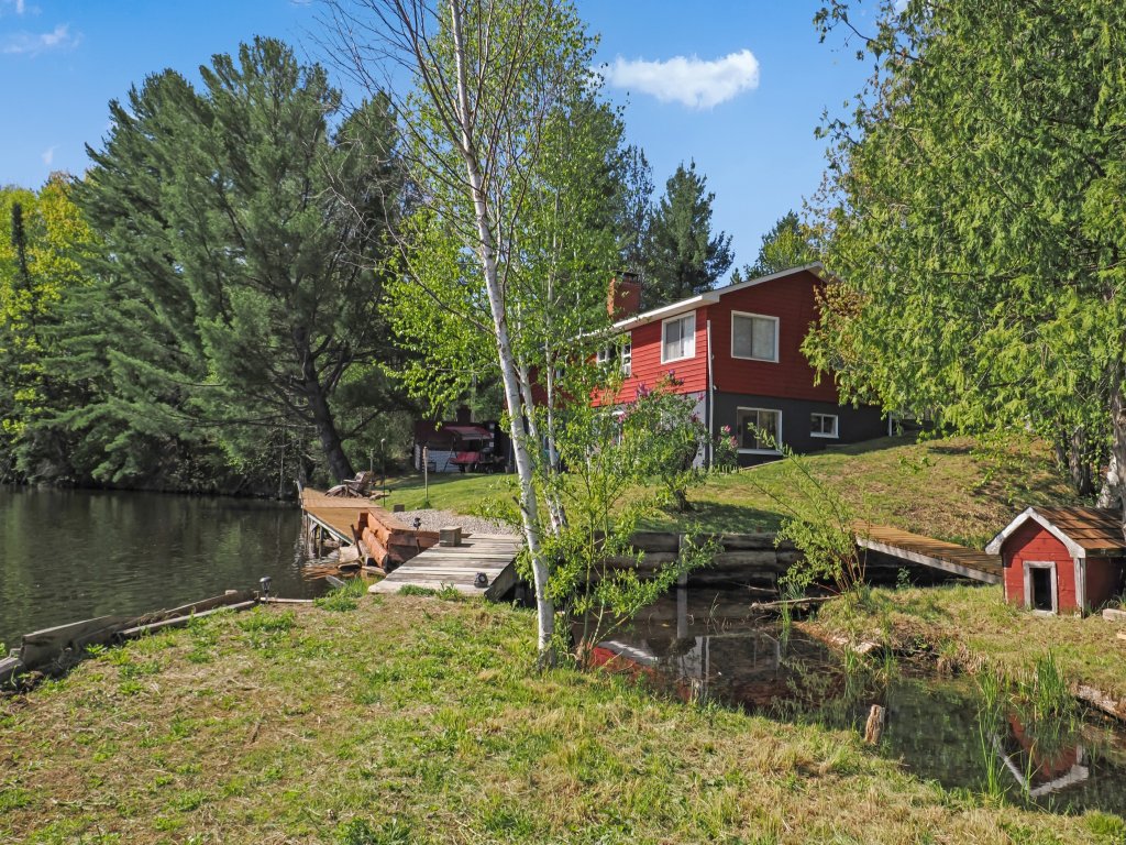 The Banks - rustic waterfront and secluded with Kayaks and Canoes included Vacation Rental in Onaway - RedAwning