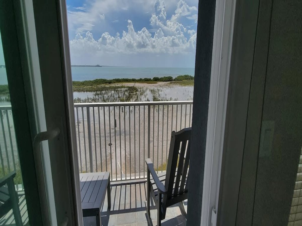 3-Level Bayfront | Boat Dock | Walk-In Pool | SPI Vacation Rental in South Padre Island - RedAwning