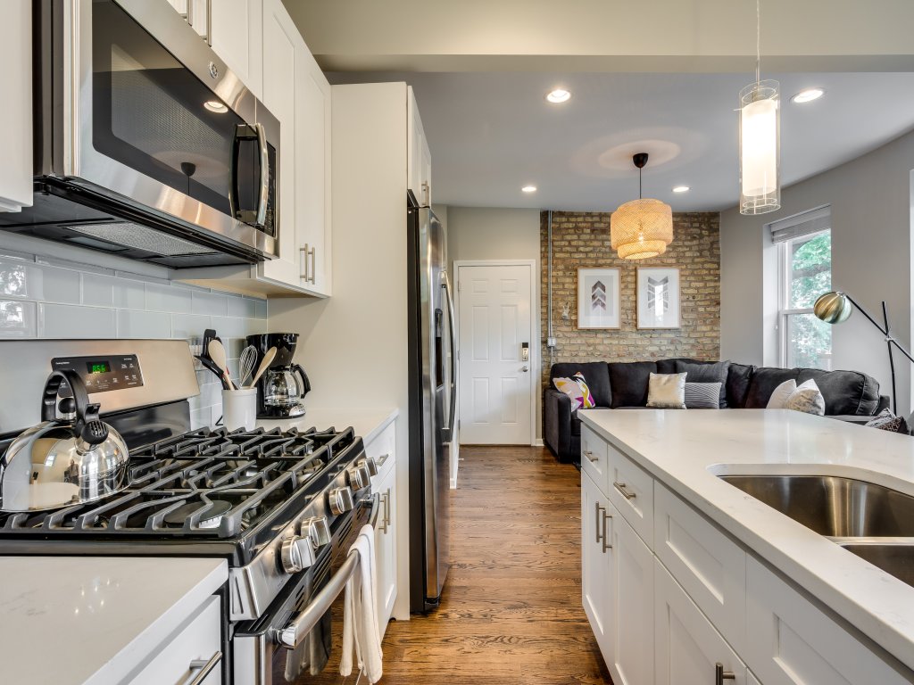 Vibrant & Stylish 4 Bed Condo near Humboldt Park Vacation Rental in Chicago - RedAwning