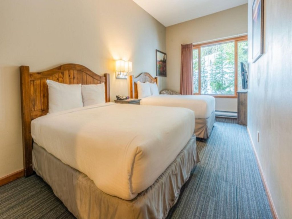 Cahilty Hotel and Suites Hotel Room, 2 Queen Sleeps 4 #2 Vacation Rental - RedAwning