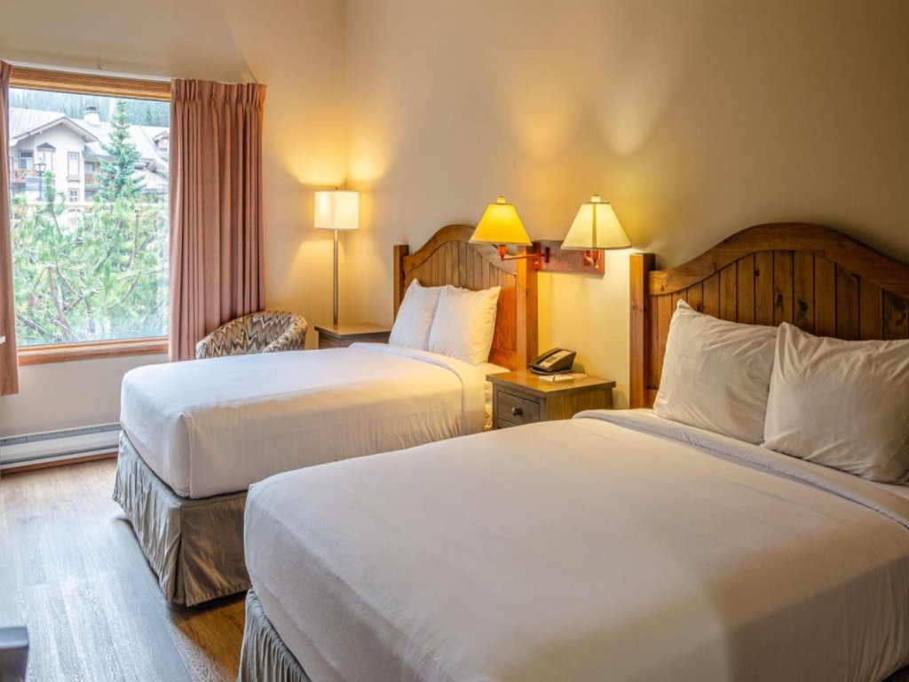Cahilty Hotel and Suites Hotel Room, 2 Queen Sleeps 4 #2 Vacation Rental - RedAwning