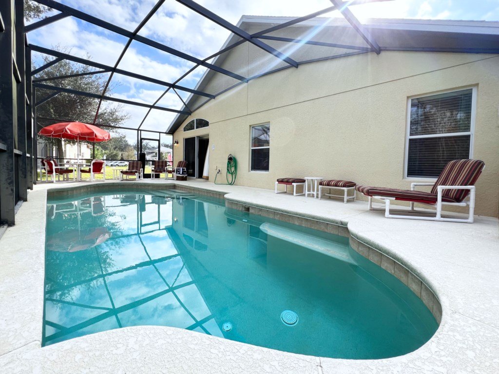 Cozy 4 Bed 3 Bath Private Pool Home with Game Room Vacation Rental in Kissimmee - RedAwning