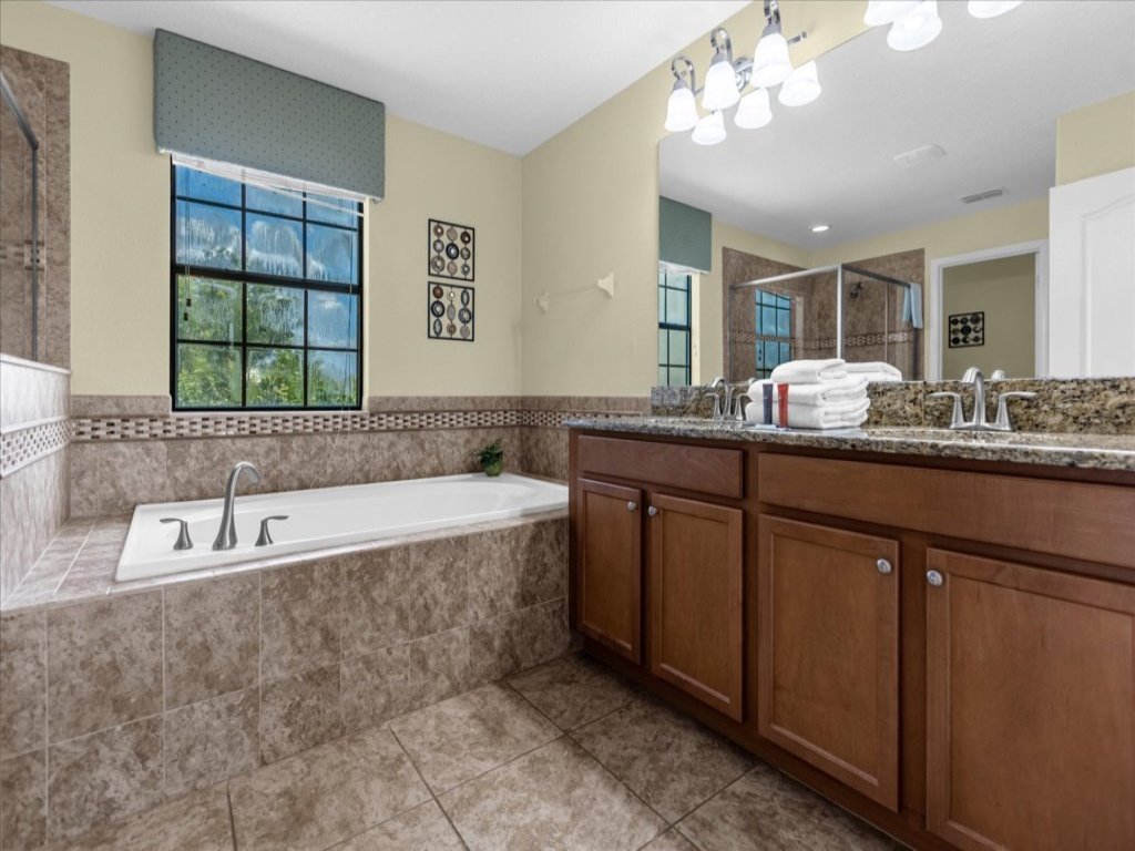 5 Bedrooms / 4.5 Bathrooms / Champions Gate Vacation Rental in Davenport - RedAwning