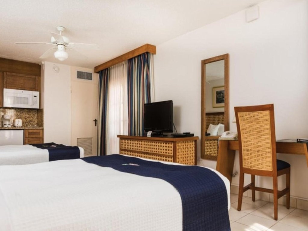 Cozy Studio Suite at Caribbean Palm Village Resort Vacation Rental - RedAwning