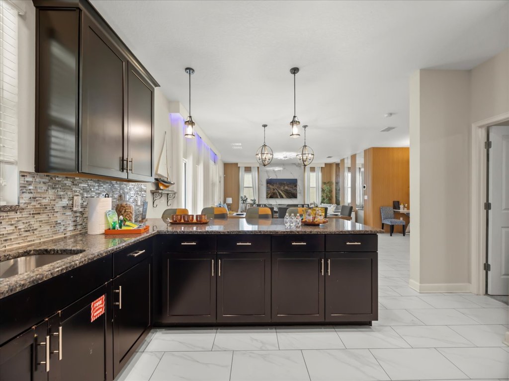 Modern Luxury at Disney’s Doorstep: Stunning 6BR/6BA Villa at Champions Gate Resort Vacation Rental in Davenport - RedAwning