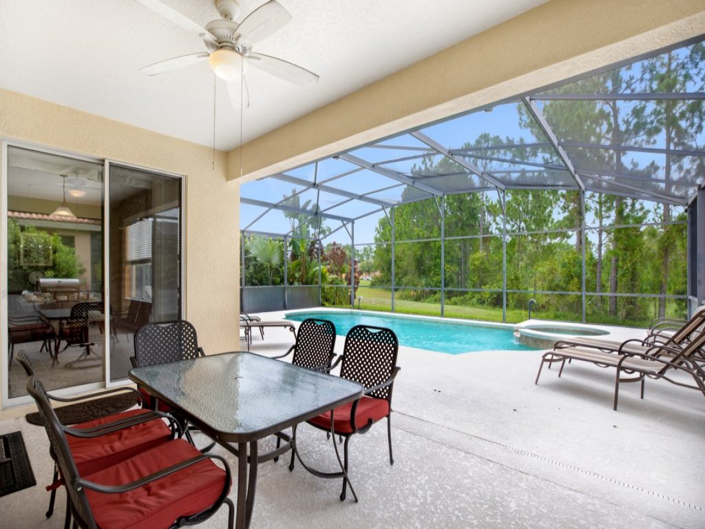 Spacious and Relaxing Home with South Facing Pool Vacation Rental in Davenport - RedAwning
