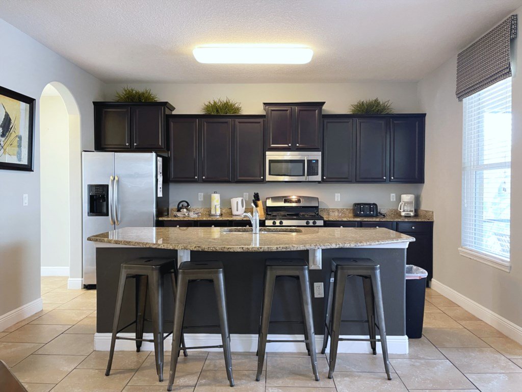Relaxing 7 Bed Pool Home with Game Room Vacation Rental in Davenport - RedAwning
