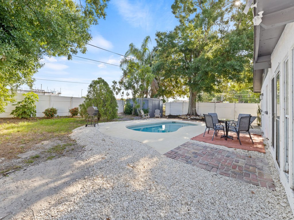 Sunny Palmetto Oasis: 4BR Home with Private Pool Vacation Rental in Florida - RedAwning