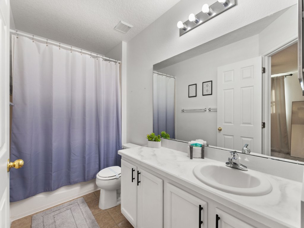 World Showcase at Windwood Bay by Shine Villas Vacation Rental in Davenport - RedAwning