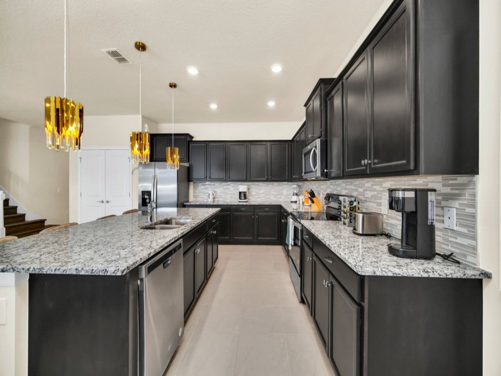 Luxury Home With Arcade, Movie Room, Private Pool Vacation Rental in Davenport - RedAwning