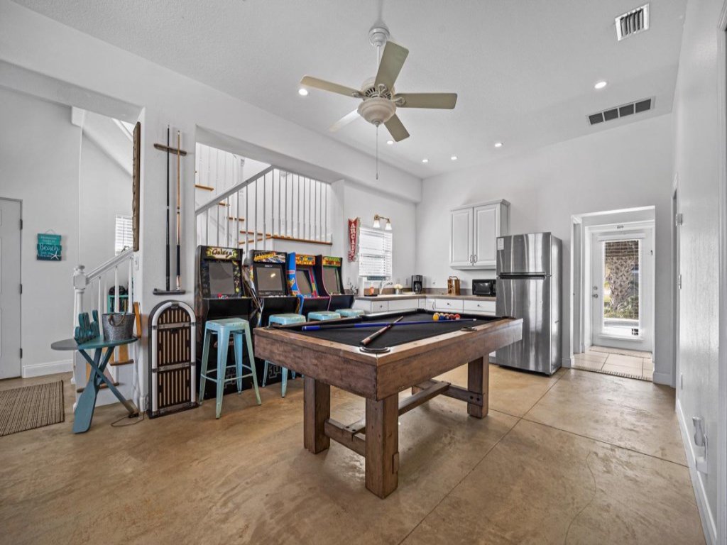 Beach Arcade 4BR Home with Pool & Grill-Sleeps 12 Vacation Rental in Palm Coast - RedAwning