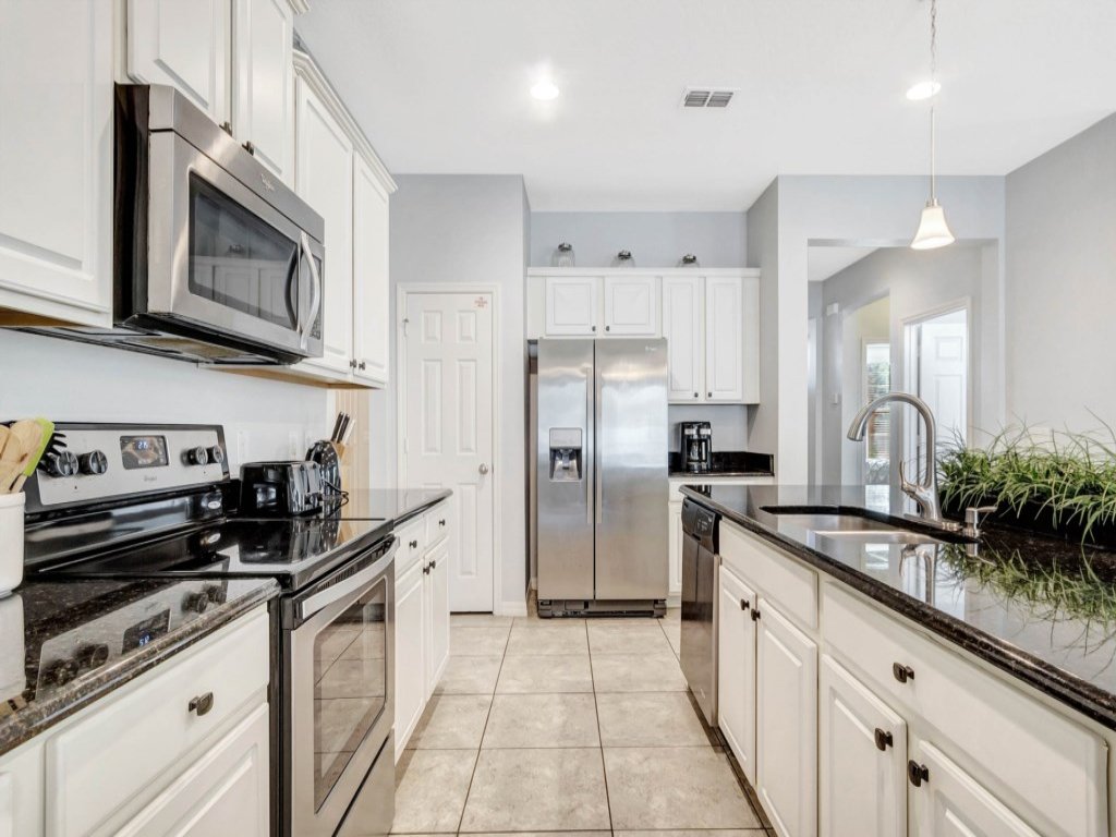 Upstair Loft Premium Home With Pool, Spa & Games! Vacation Rental in Davenport - RedAwning