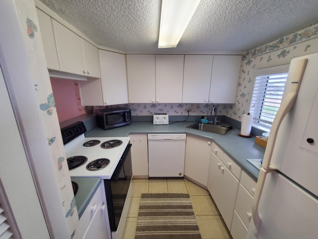 Tradewinds 151, Beach Condo, Poolside Relaxation Vacation Rental in St. Augustine - RedAwning