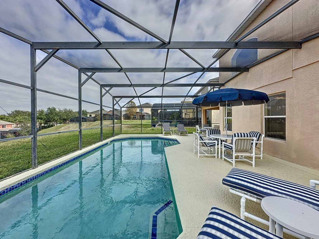 Emerald Island Four Bed Pool Home close to Disney Vacation Rental in Kissimmee - RedAwning