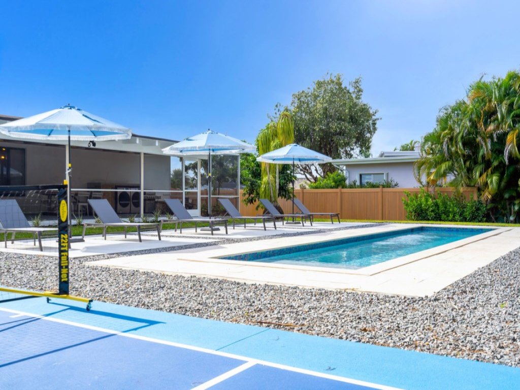 4BR Biscayne River Home with Pool & Pickleball Fun Vacation Rental in Miami - RedAwning